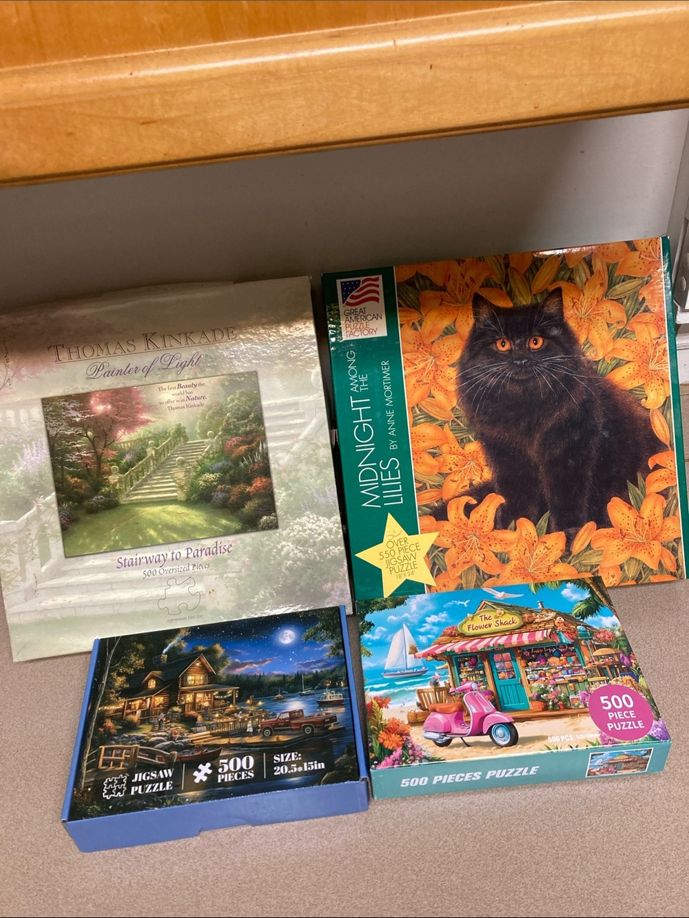 4 count assorted puzzles including Age Midnight Lilies Puzzle
